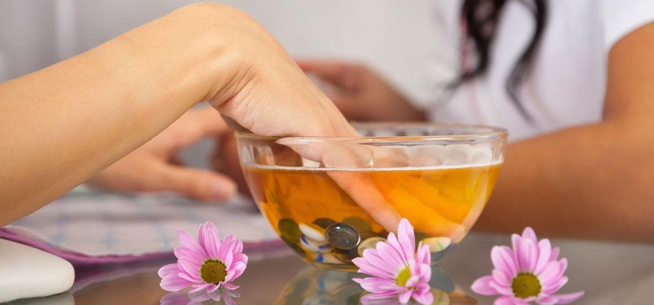 What are the risks of a Hot Oil Manicure?