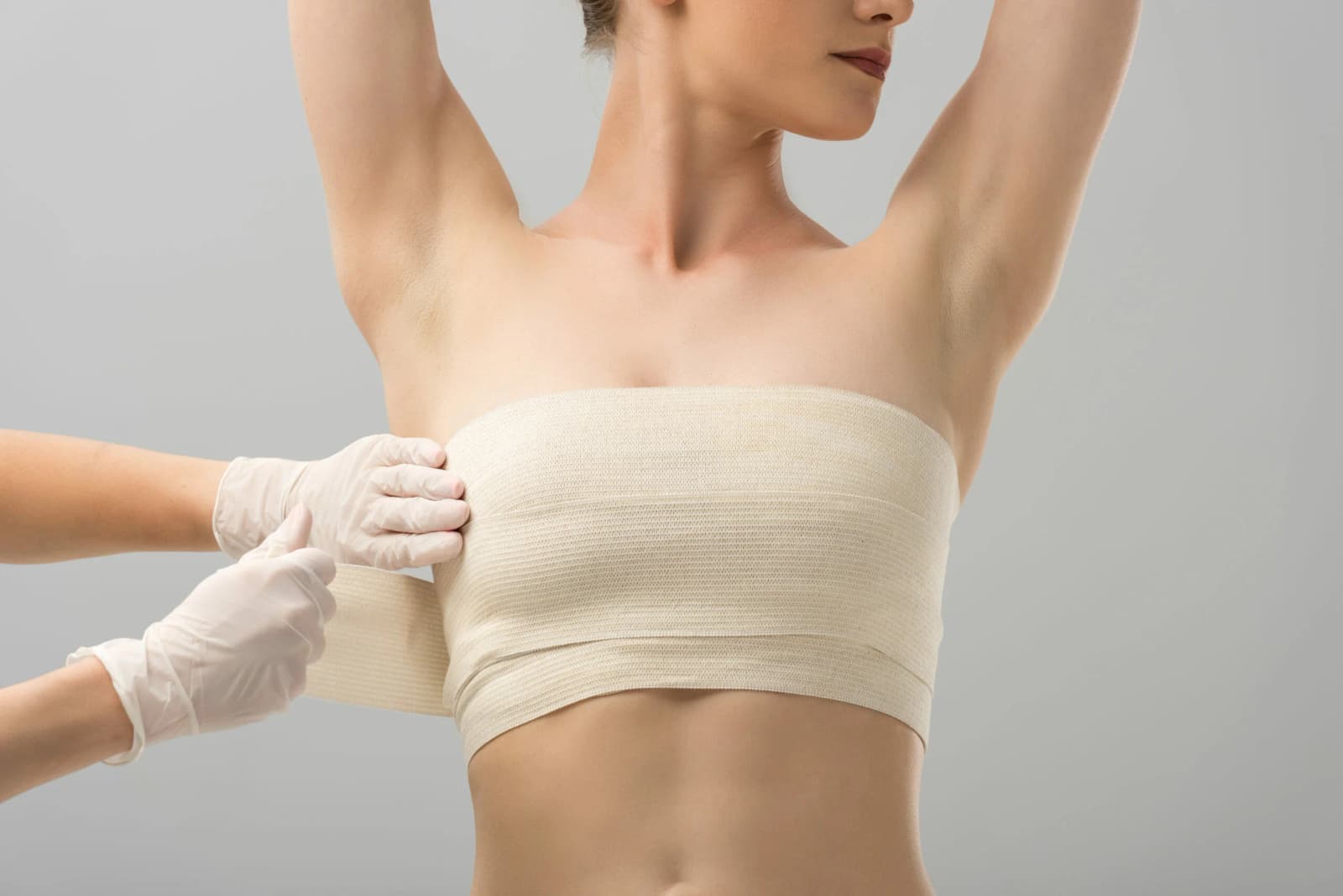 What are the risks of breast reduction surgery?