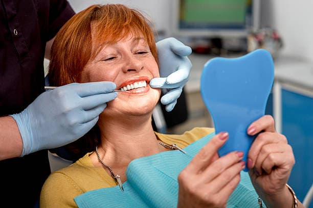 How are dentures made?
