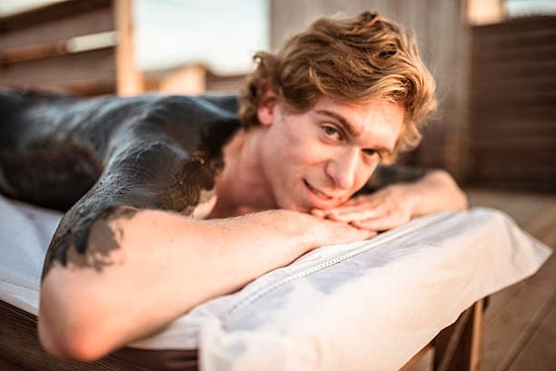 Why are mud baths considered therapeutic?