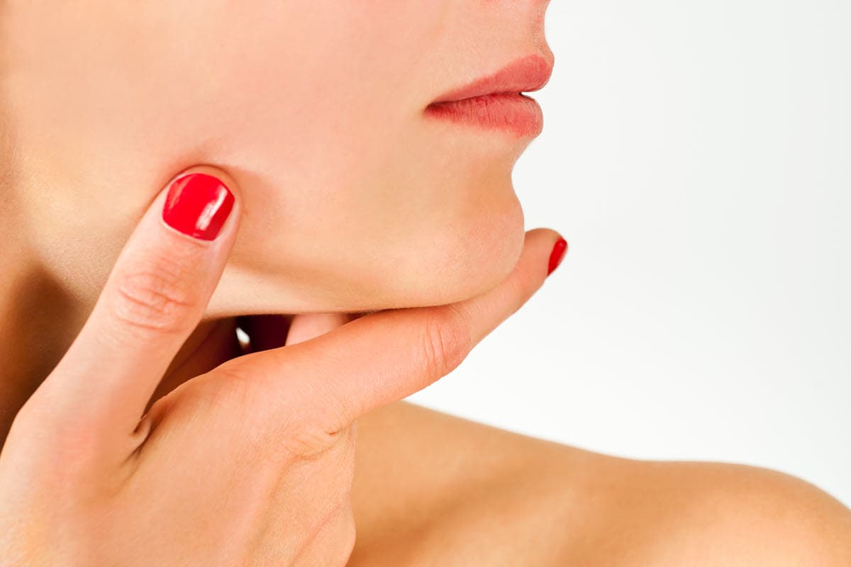 What are the disadvantages of a chin implant?